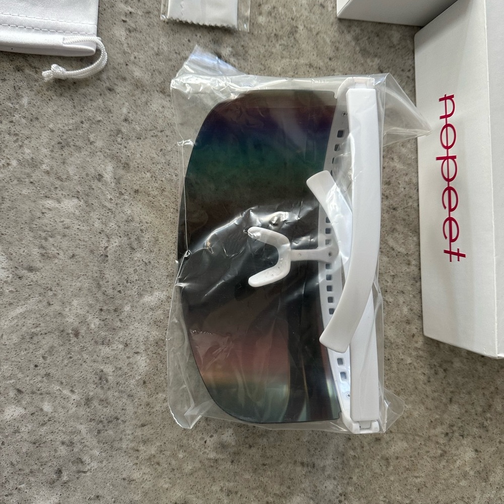 NoPeet sunglasses. New in box, with cinch bag